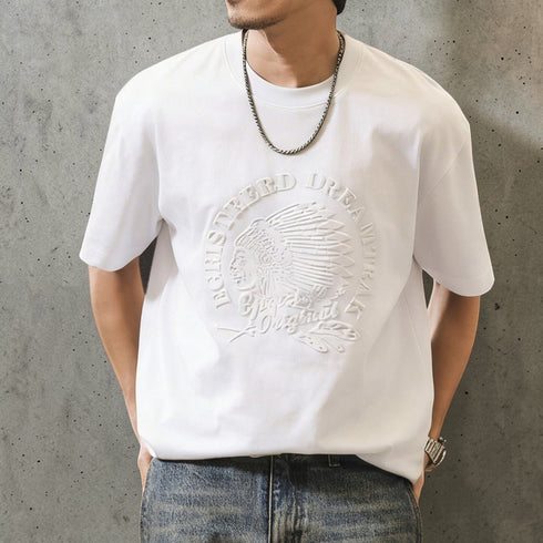 PEAK BLUE white cotton t-shirt with embossed Native American graphic motif and crew neck. Short sleeves.